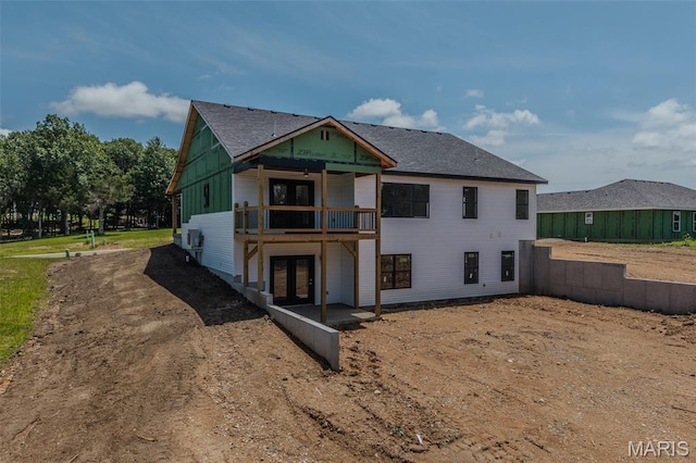 1817 Vadie Ave, Lebanon, MO 65536 - rear view of house featuring french doors and a balcony