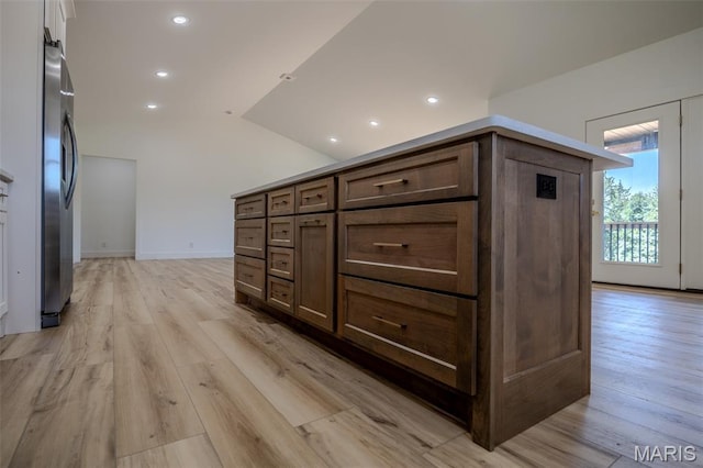 1817 Vadie Ave, Lebanon, MO 65536 - corridor featuring light wood-style floors, vaulted ceiling, and recessed lighting