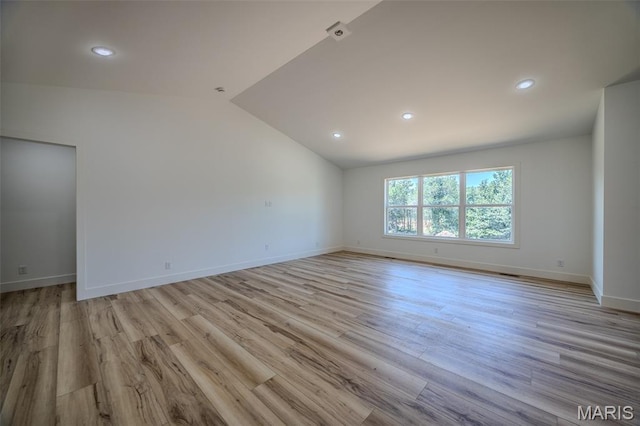 1817 Vadie Ave, Lebanon, MO 65536 - empty room featuring lofted ceiling, light wood-type flooring, and recessed lighting