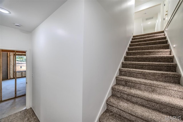 1817 Vadie Ave, Lebanon, MO 65536 - stairs with carpet flooring and baseboards