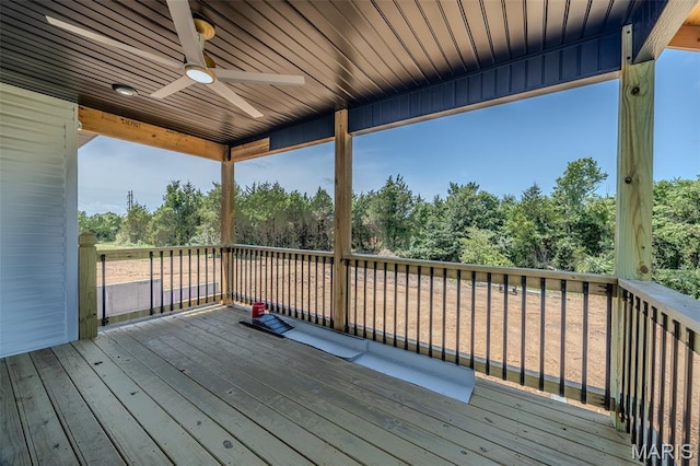 1817 Vadie Ave, Lebanon, MO 65536 - wooden deck with a ceiling fan and view of scattered trees
