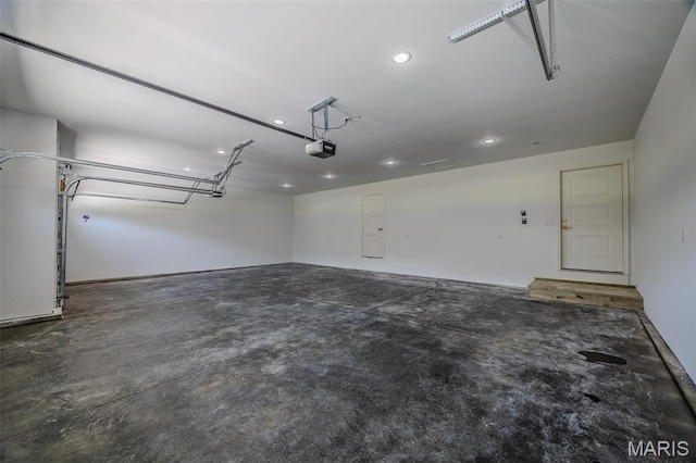 1817 Vadie Ave, Lebanon, MO 65536 - garage with a garage door opener and recessed lighting