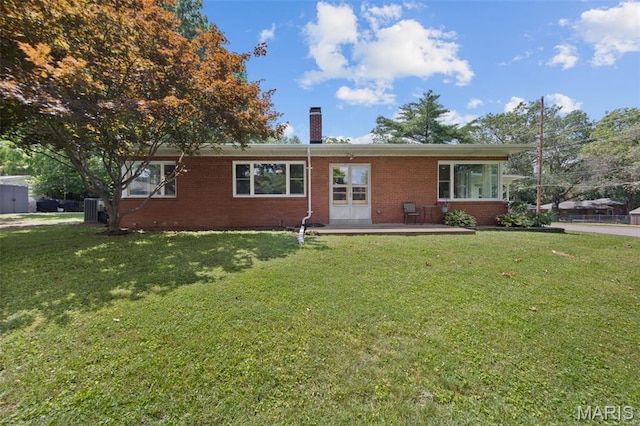 7700 Weil Ave, Saint Louis, MO 63119 - single story home featuring a chimney, brick siding, a front lawn, and a patio area