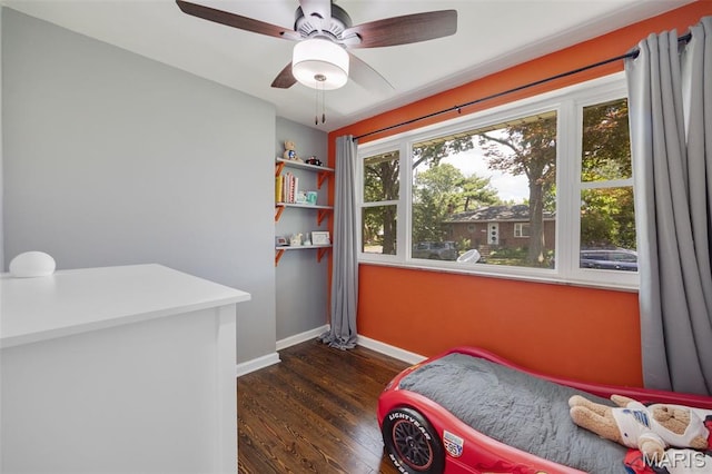 7700 Weil Ave, Saint Louis, MO 63119 - bedroom with dark wood-type flooring and a ceiling fan
