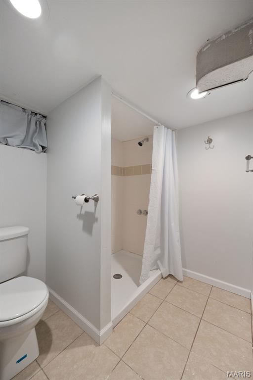 7700 Weil Ave, Saint Louis, MO 63119 - full bath with tile patterned flooring and a stall shower