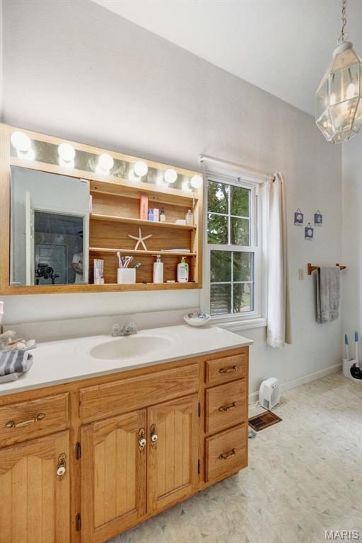 204 E Jefferson St, Potosi, MO 63664 - bathroom with vanity and baseboards
