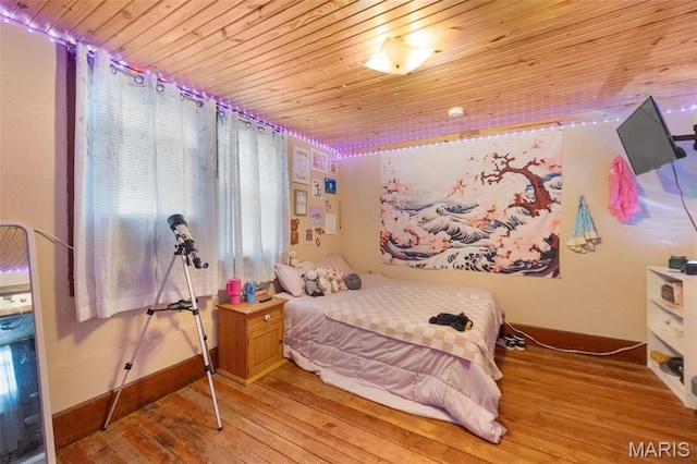 204 E Jefferson St, Potosi, MO 63664 - bedroom with hardwood / wood-style floors, wooden ceiling, and multiple windows