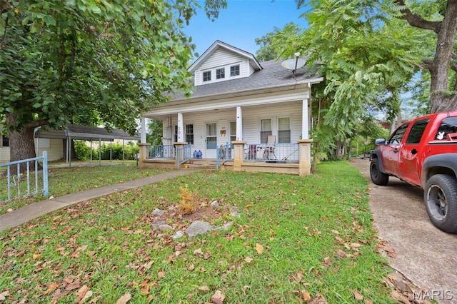 204 E Jefferson St, Potosi, MO 63664 - bungalow-style home featuring covered porch, a front lawn, and a shingled roof