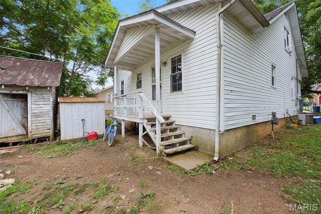204 E Jefferson St, Potosi, MO 63664 - view of side of property with a storage unit