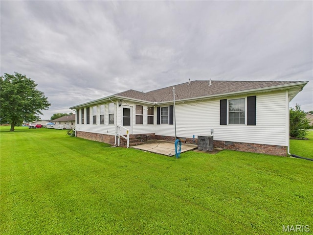 1110 State Highway Ad, Dexter, MO 63841 - rear view of property with a patio area, a lawn, roof with shingles, and crawl space