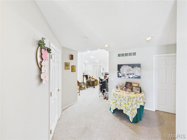 1110 State Highway Ad, Dexter, MO 63841 - living area featuring carpet floors and a textured ceiling
