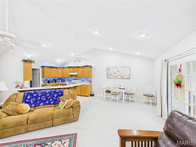 1110 State Highway Ad, Dexter, MO 63841 - living room with lofted ceiling, a ceiling fan, and light carpet