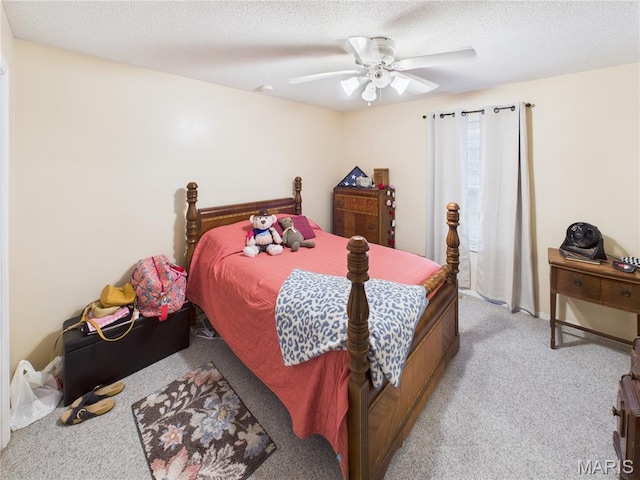 1110 State Highway Ad, Dexter, MO 63841 - bedroom with light colored carpet, ceiling fan, and a textured ceiling