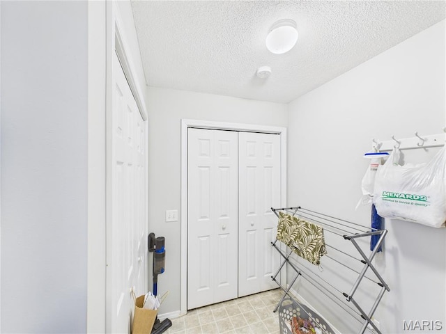 1110 State Highway Ad, Dexter, MO 63841 - hallway featuring a textured ceiling