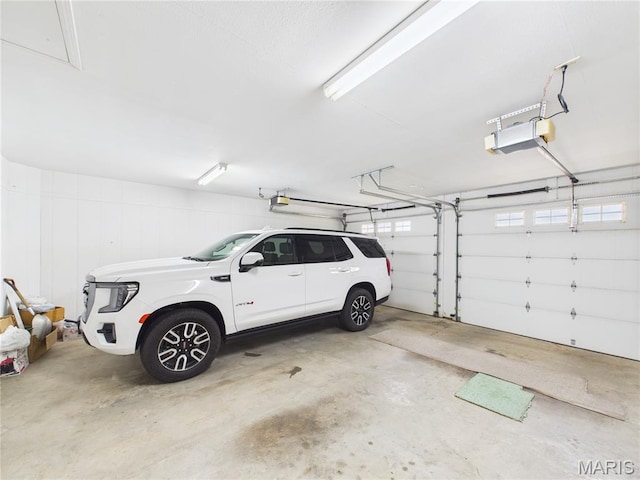 1110 State Highway Ad, Dexter, MO 63841 - garage featuring a garage door opener