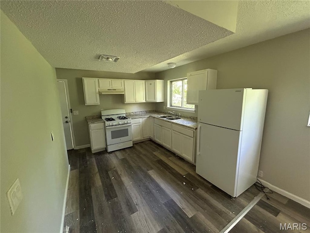 10205 Northland Hills Ct, Ferguson Township, MO 63136 - kitchen with white appliances, a textured ceiling, dark wood-type flooring, white cabinets, and under cabinet range hood