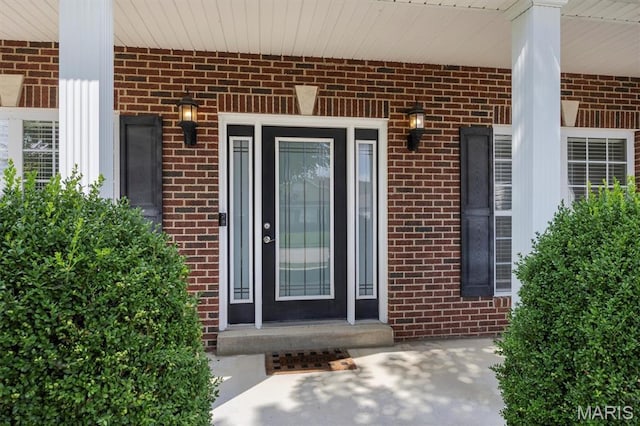 1305 Monarch Lake Ln, Shiloh, IL 62221 - view of exterior entry with brick siding and covered porch