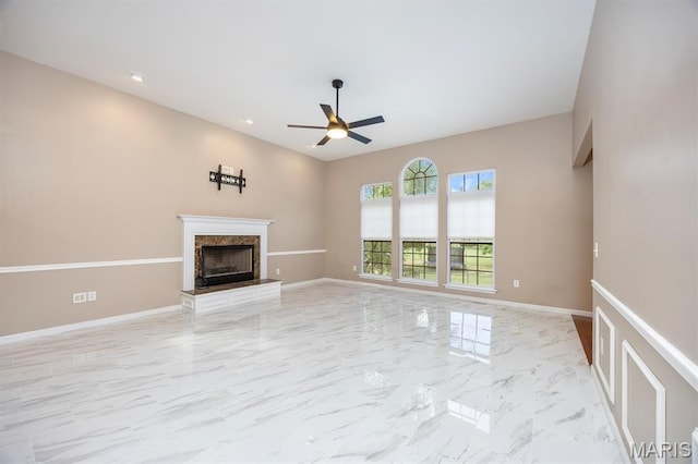 1305 Monarch Lake Ln, Shiloh, IL 62221 - unfurnished living room with ceiling fan, light marble finish floors, and a fireplace