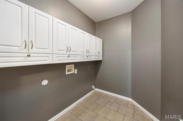 1305 Monarch Lake Ln, Shiloh, IL 62221 - washroom with cabinet space, hookup for a washing machine, electric dryer hookup, and light tile patterned floors
