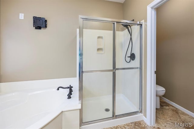 1305 Monarch Lake Ln, Shiloh, IL 62221 - bathroom featuring a stall shower and a bath