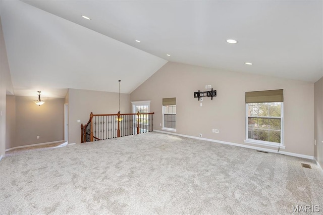 1305 Monarch Lake Ln, Shiloh, IL 62221 - unfurnished living room featuring lofted ceiling, carpet flooring, and recessed lighting