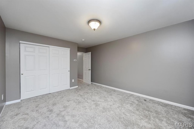 1305 Monarch Lake Ln, Shiloh, IL 62221 - unfurnished bedroom with carpet flooring and a closet
