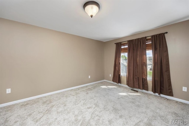 1305 Monarch Lake Ln, Shiloh, IL 62221 - empty room with baseboards and carpet floors