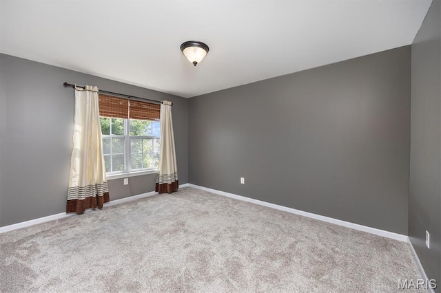 1305 Monarch Lake Ln, Shiloh, IL 62221 - unfurnished room featuring baseboards and carpet