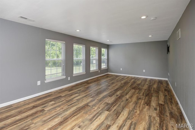 1305 Monarch Lake Ln, Shiloh, IL 62221 - empty room with dark wood-type flooring, recessed lighting, and a smoke detector