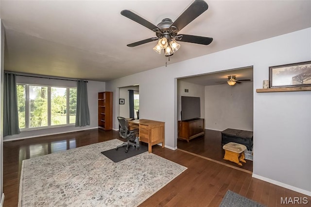 3644 Crestview Dr, Hillsboro, MO 63050 - office with ceiling fan and dark wood-style floors