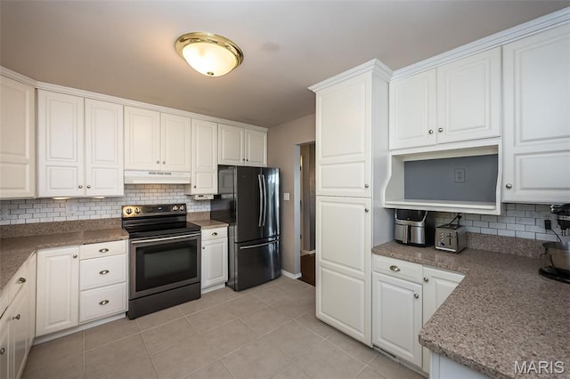 3644 Crestview Dr, Hillsboro, MO 63050 - kitchen with stainless steel electric range oven, freestanding refrigerator, under cabinet range hood, decorative backsplash, and white cabinetry