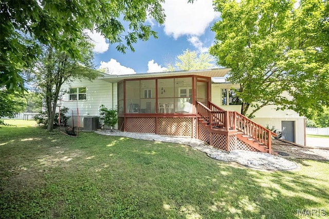 3644 Crestview Dr, Hillsboro, MO 63050 - back of property featuring stairway, a sunroom, and a lawn