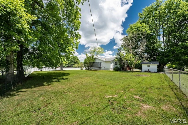 3644 Crestview Dr, Hillsboro, MO 63050 - fenced backyard featuring a shed and a trampoline