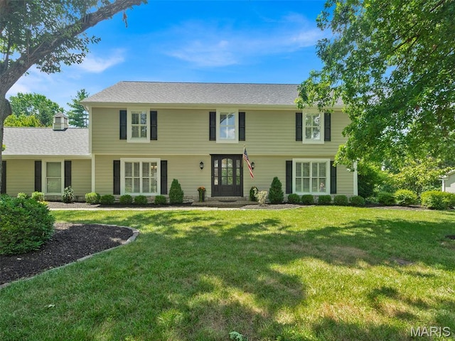 1571 Yarmouth Point Dr, Chesterfield, MO 63017 - colonial inspired home with a front yard and a chimney