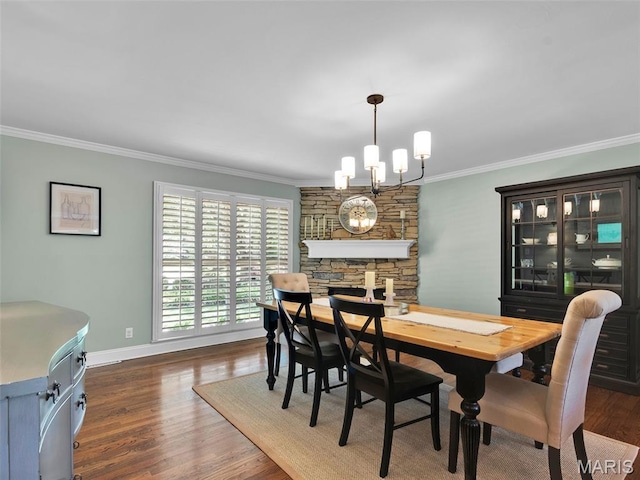 1571 Yarmouth Point Dr, Chesterfield, MO 63017 - dining room featuring crown molding, wood finished floors, and a chandelier