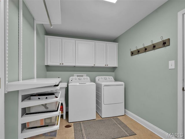 1571 Yarmouth Point Dr, Chesterfield, MO 63017 - laundry room featuring cabinet space and washing machine and clothes dryer