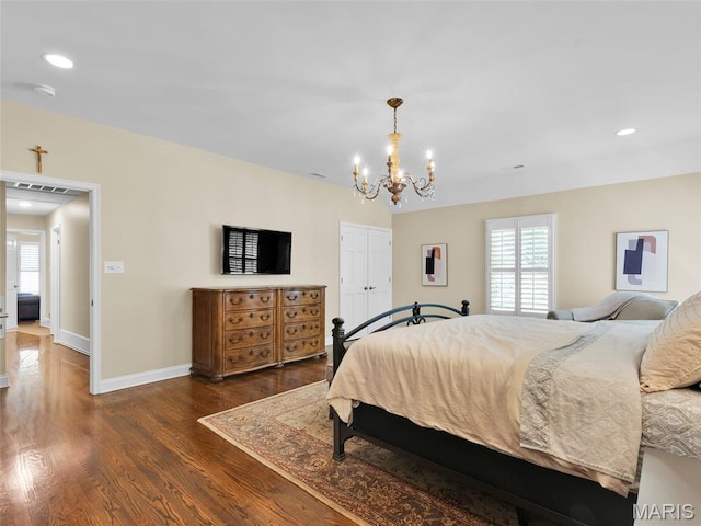 1571 Yarmouth Point Dr, Chesterfield, MO 63017 - bedroom featuring a chandelier, dark wood-style floors, a closet, and recessed lighting