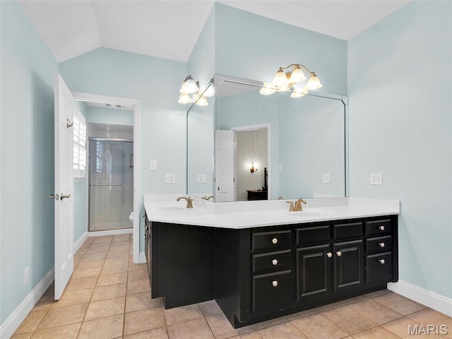 1571 Yarmouth Point Dr, Chesterfield, MO 63017 - bathroom with double vanity, a stall shower, tile patterned flooring, and vaulted ceiling