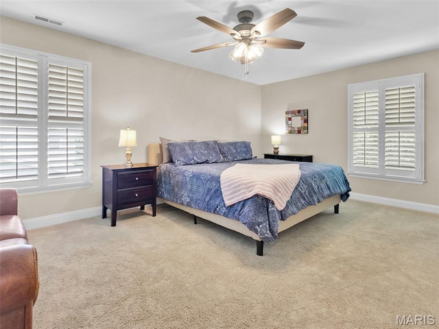 1571 Yarmouth Point Dr, Chesterfield, MO 63017 - carpeted bedroom featuring multiple windows and ceiling fan