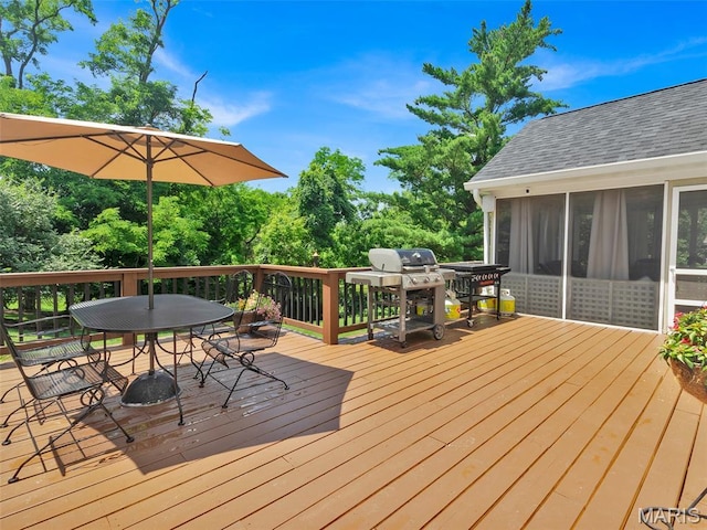1571 Yarmouth Point Dr, Chesterfield, MO 63017 - deck featuring outdoor dining space, grilling area, and a sunroom