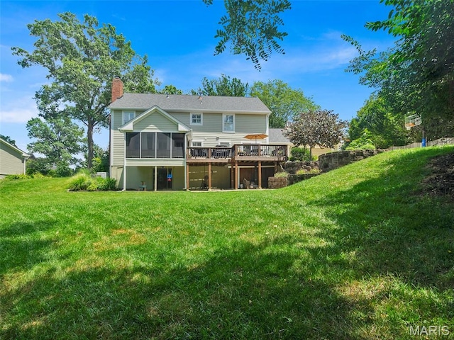 1571 Yarmouth Point Dr, Chesterfield, MO 63017 - rear view of house with a sunroom, a chimney, a wooden deck, and a yard