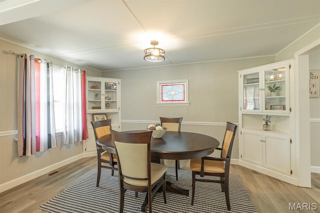 250 Hi Pointe Pl, East Alton, IL 62024 - dining room with light wood-style floors and crown molding