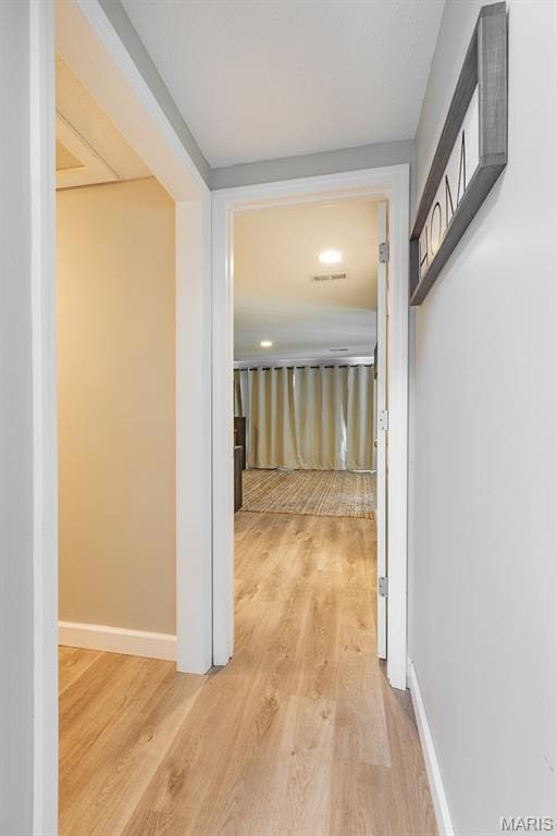 250 Hi Pointe Pl, East Alton, IL 62024 - corridor featuring light wood-style flooring and baseboards