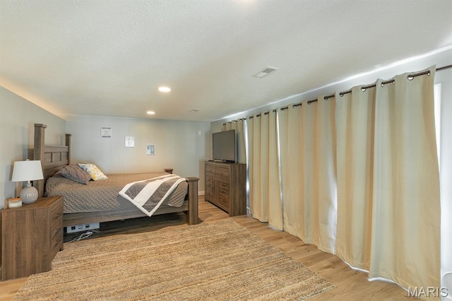 250 Hi Pointe Pl, East Alton, IL 62024 - bedroom featuring light wood-type flooring and recessed lighting