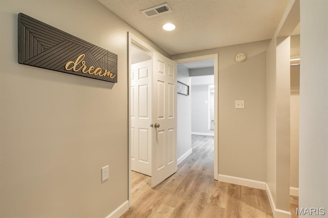 250 Hi Pointe Pl, East Alton, IL 62024 - corridor with light wood finished floors, a textured ceiling, and recessed lighting