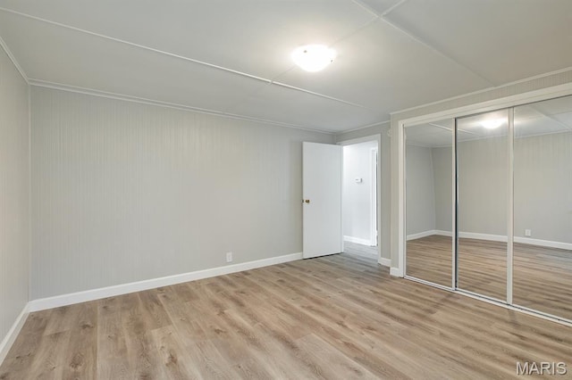 250 Hi Pointe Pl, East Alton, IL 62024 - unfurnished bedroom featuring wood finished floors and a closet