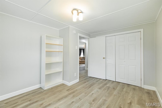 250 Hi Pointe Pl, East Alton, IL 62024 - unfurnished bedroom featuring wood finished floors, a closet, and crown molding