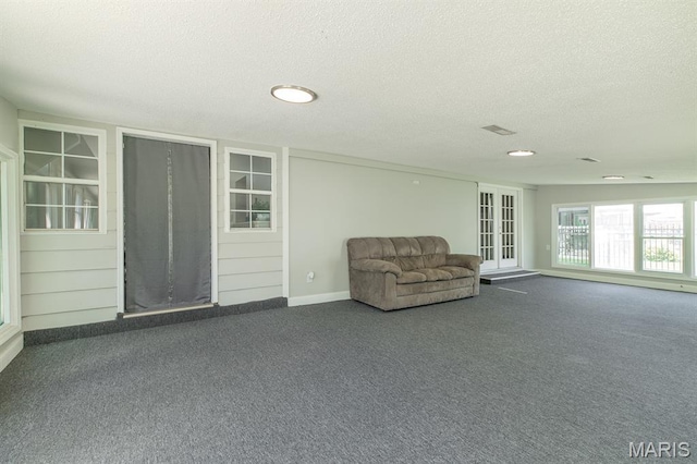 250 Hi Pointe Pl, East Alton, IL 62024 - unfurnished room featuring a textured ceiling and dark carpet