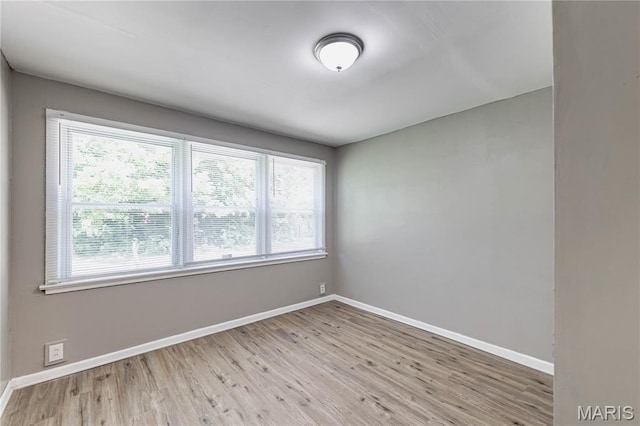 1105 Pennsylvania Ave, Saint Louis, MO 63130 - unfurnished room with plenty of natural light and wood finished floors