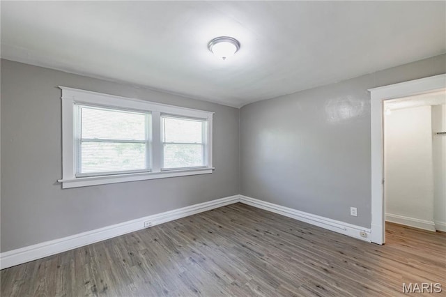 1105 Pennsylvania Ave, Saint Louis, MO 63130 - empty room featuring wood finished floors and baseboards